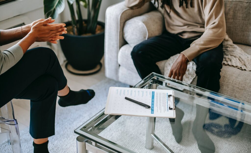 therapist having a mental treatment with employee